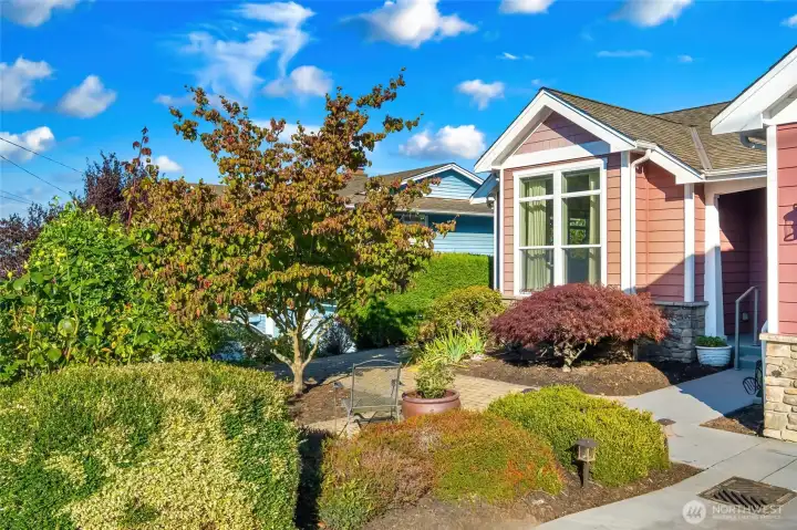 Mature landscaping is a beautiful touch to this home
