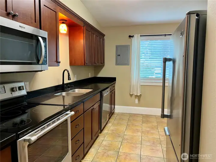 Unit 142 kitchen with SS appliances