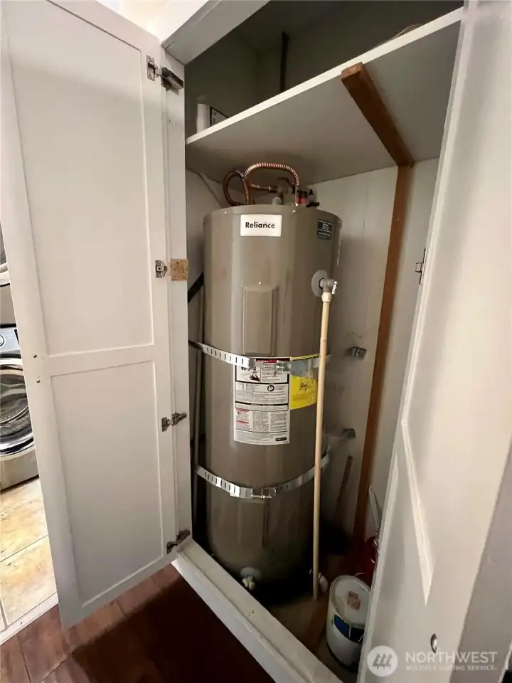 Hot water tank in hall closet