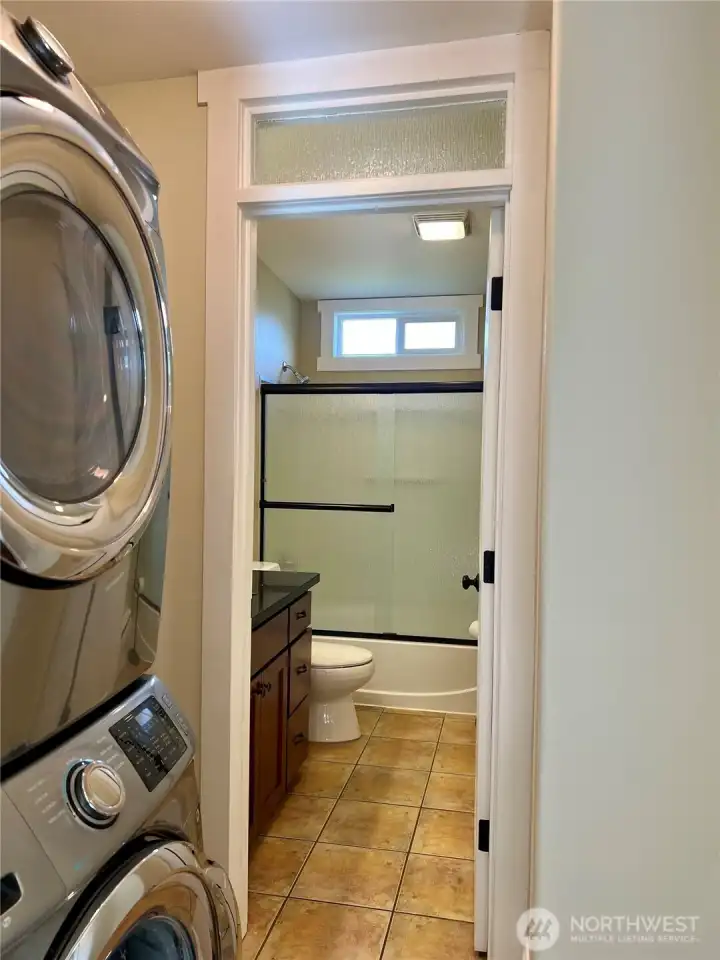 Unit 140 ss stack front load w/d and full bathroom