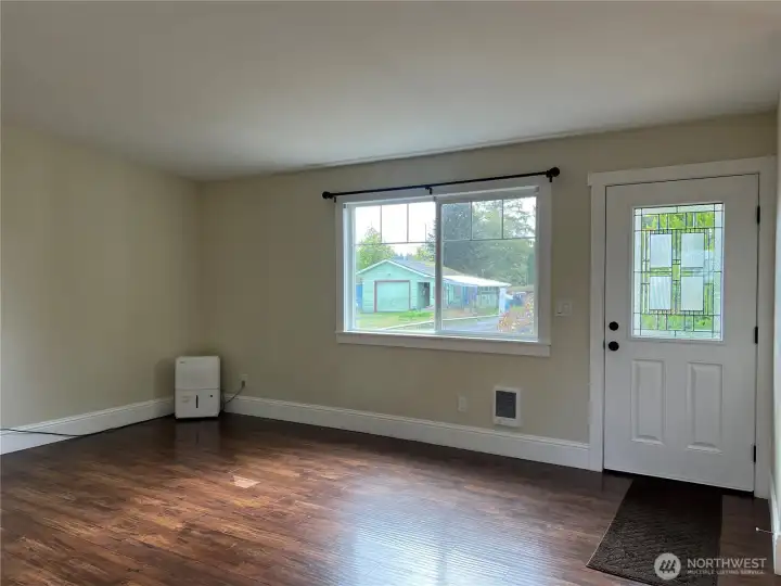 Unit 140 living room and front entry