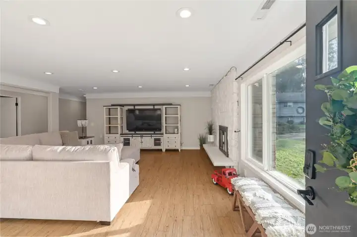 large living room with an abundance of natural lighting