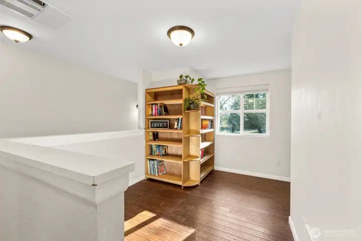 Landing at the top of the stairs makes a great office or additional living space.