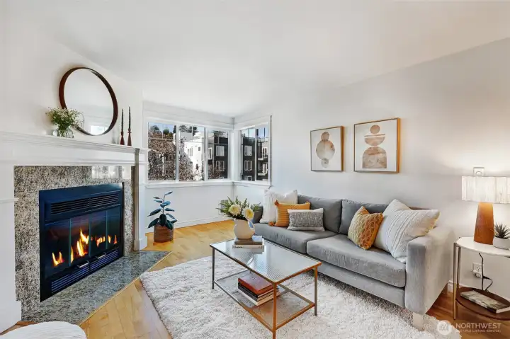 The nook under the window is the perfect sunny spot for a desk / home office.