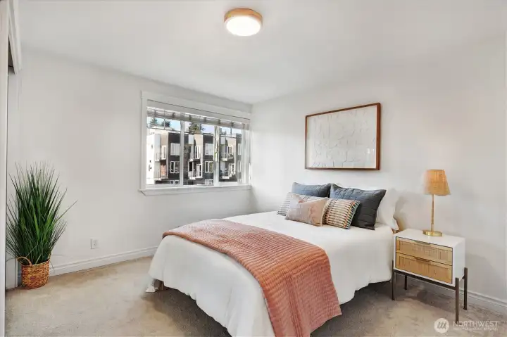 Wake to soft morning light and songbirds outside your window in this ideal in-city retreat.
