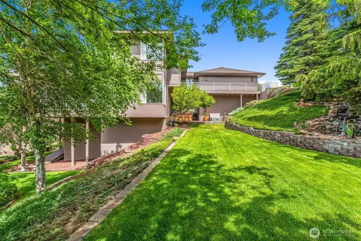 Yard, Waterfall, patio and lower 1300+ sq ft storage..etc