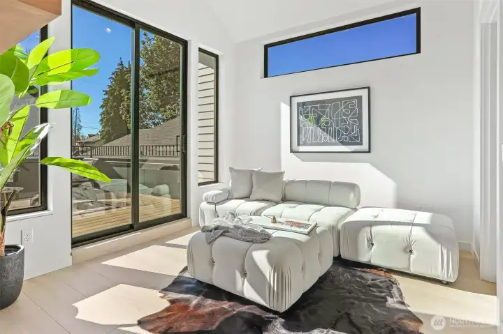 Upper Level Media Room with Vaulted Ceilings