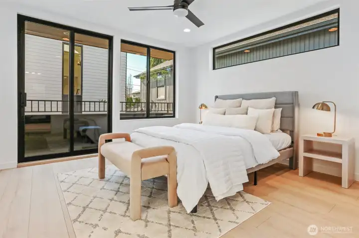 Spacious Private Suite Retreat with Oversized Windows/Sliders to Balcony, Ceiling Fan and Built-In Heating/Cooling