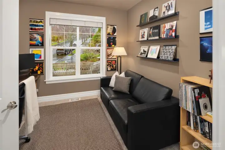 Main level Den with a closet so could double as a main level bedroom