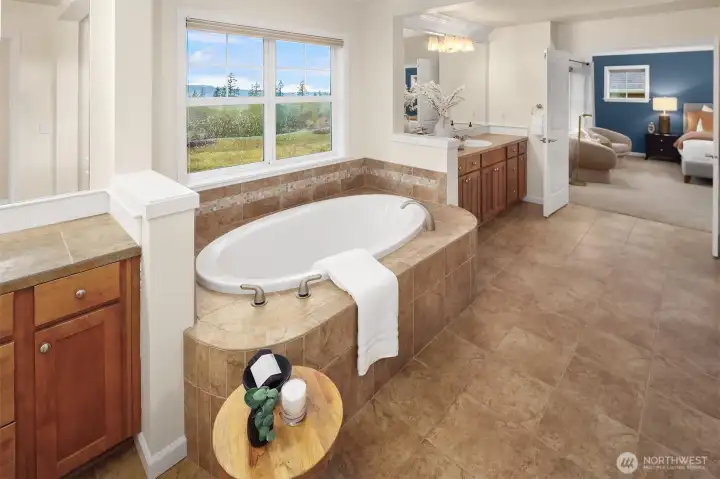 Large Primary bath sanctuary with dual closets and huge walk in shower.