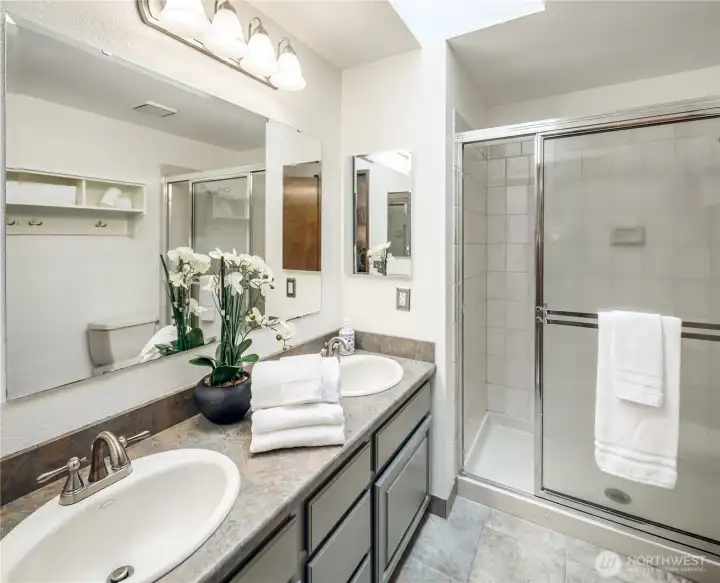 Updated primary bath with dual vanity.