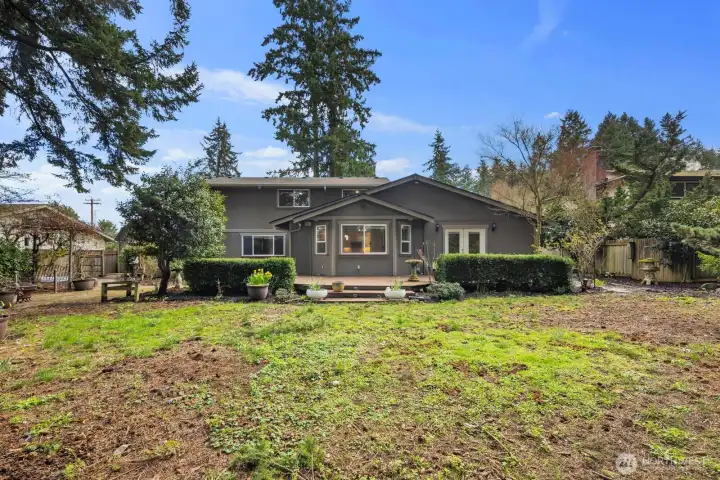 Outdoor patio space perfect for relaxing or entertaining while overlooking the landscaped backyard.