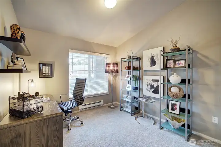 Bedroom 2 with vaulted ceiling.