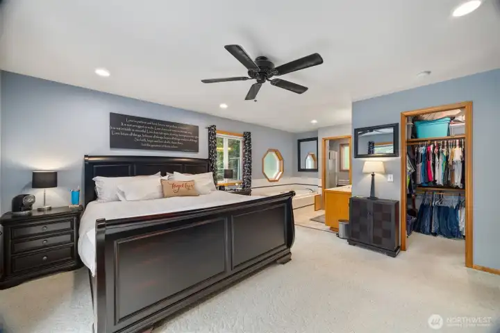 The primary suite is very spacious and has a walk in closet as well as a separate jetted tub and over-sized shower.