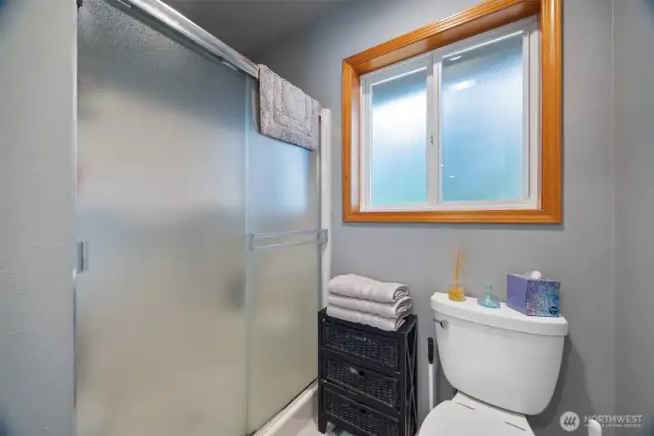 The primary bath has an oversized shower/toilet room.