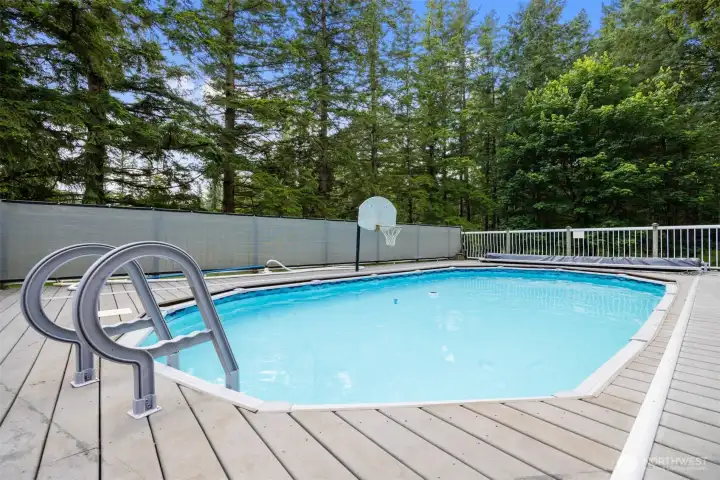There is a privacy screen along the south fence at the pool, and it is fully fenced.