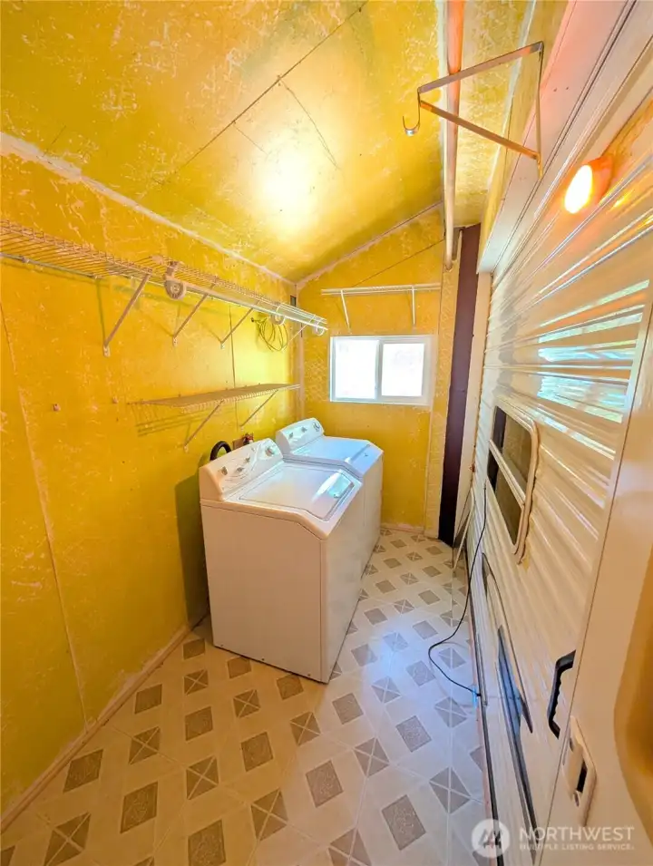 Utility room w/ washer & Dryer to convey.