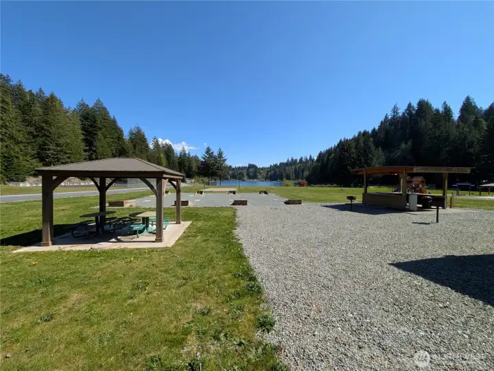 Community picnic area complete with horseshoes, covered eating areas, playground, athletic court, and miniature golf!