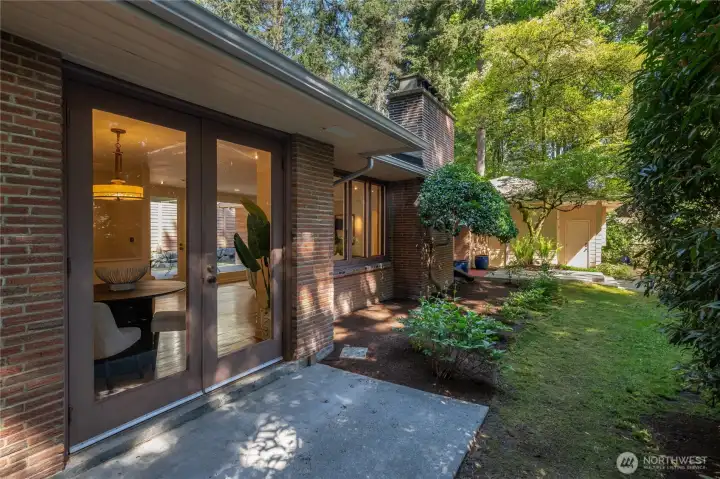 Dining room opens to the private yard