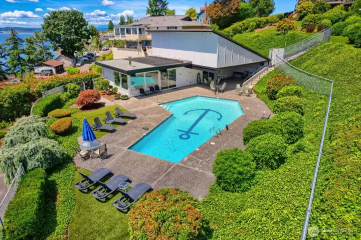Community outdoor pool and clubhouse surrounded by beautifully maintained grounds. Community outdoor pool and clubhouse surrounded by beautifully maintained grounds.