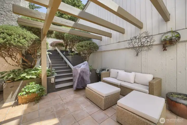 Private courtyard entry connecting the garage to the home. Private courtyard entry connecting the garage to the home.