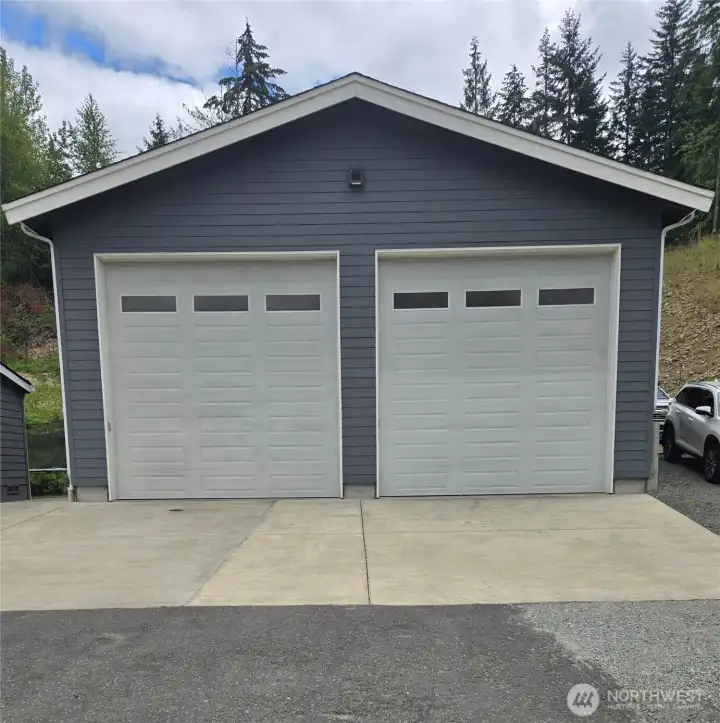 Ample Heated Shop With DBL 14 X 14 Foot Doors & a Side Man Door. Auto Openers on Both Doors W/Exterior Code Opener