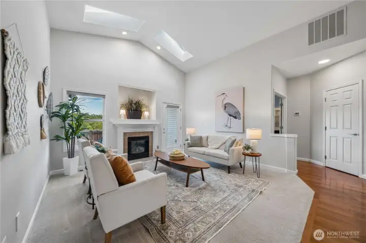 Just down the hall from the living room, you'll find the spacious primary suite.