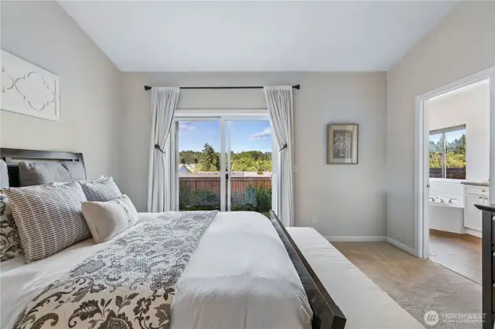 Just off the primary suite is the beautifully updated five-piece en suite bath.
