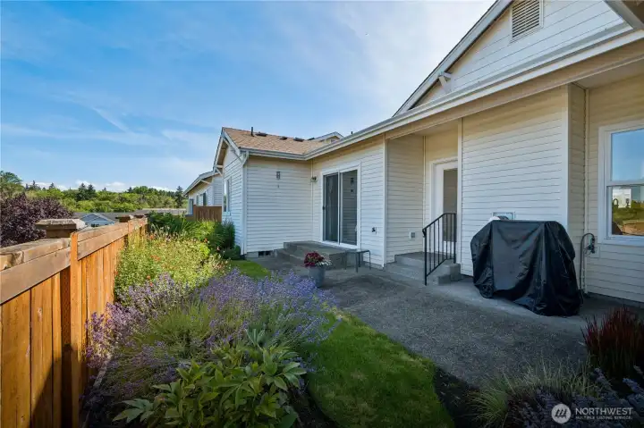 The fully fenced backyard offers just the right amount of space for gardening and flowers, while the HOA handles lawn maintenance. There's plenty of room for outdoor furniture, and the gas hookup makes grilling and entertaining a breeze.