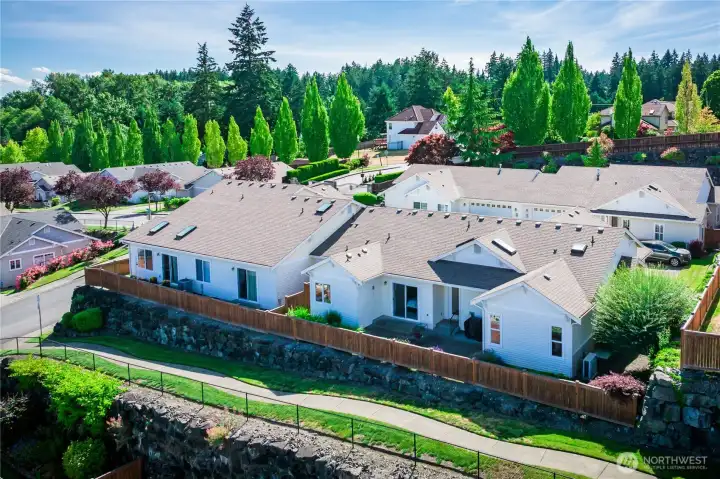 Perched on a hill at the end of a dead-end street, this condo enjoys exceptional privacy with no passing traffic, no street views, and no imposing walls - just peaceful surroundings and open skies.