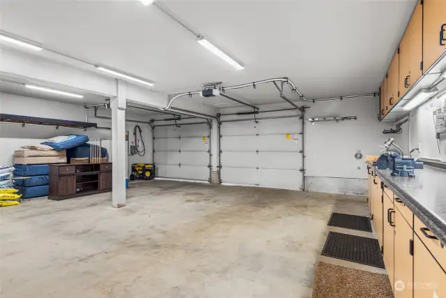 Basement - 2 car garage with 26ft workshop area with tons of storage space