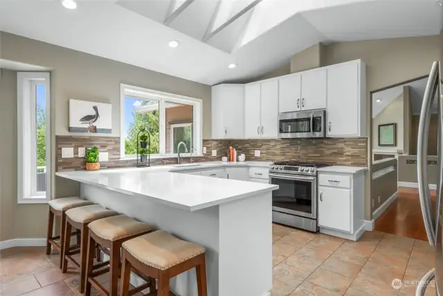 Kitchen - Naturally lit room with multiple skylights