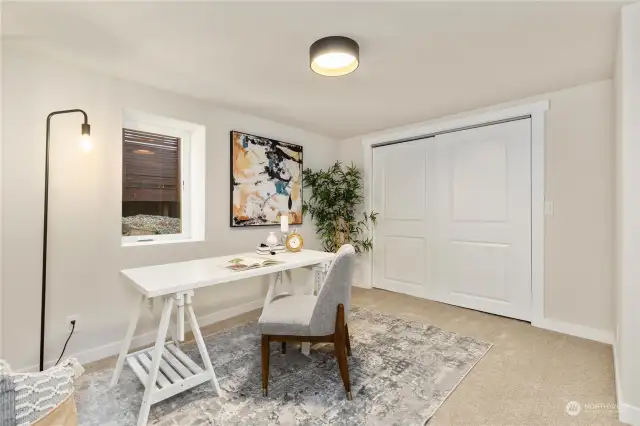 Here is lower level 5th bedroom that could be used as office of possible rental air b n b also with its own access out back of home and alley