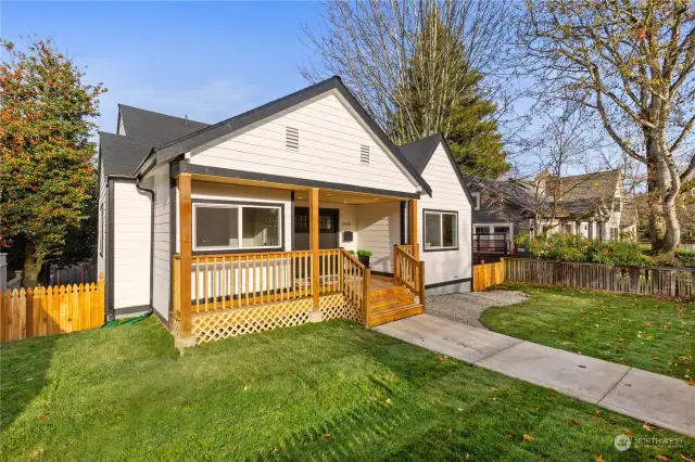 Here is another front view of home with all new landscaping decking concrete walk way to front entrance for guests