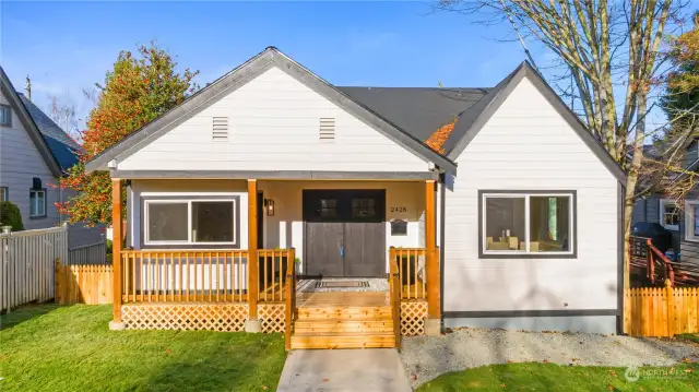 Second view of your completely remodeled Tudor home with all new landscaping, fencing,siding and modern colors inside and out.  Come check out this 1.5 story with basement home ready for next owners