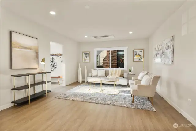 Second view of open concept great room next to mud room just off entry way and kitchen.  Check out the built in Ductless mini split in ceiling to keep you warm and cool in summers
