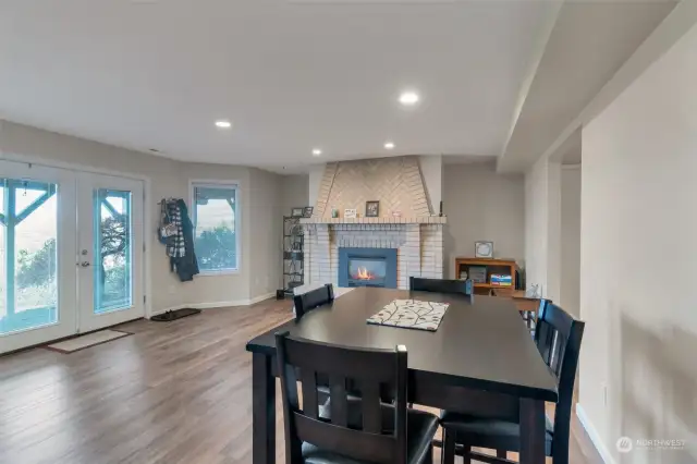 Inside the Apartment - Dining area also includes a beautiful gas fireplace.