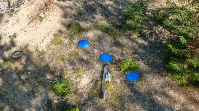 Septic system has been installed. The lot is served by a community drainfield.