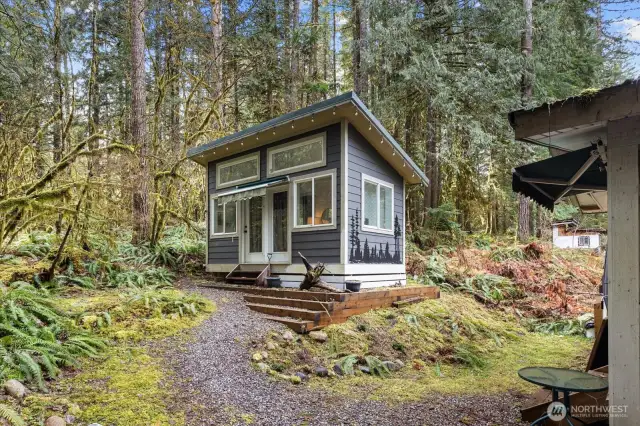 Don't miss the fully enclosed Gazebo made for all the seasons tucked back behind near the trees!