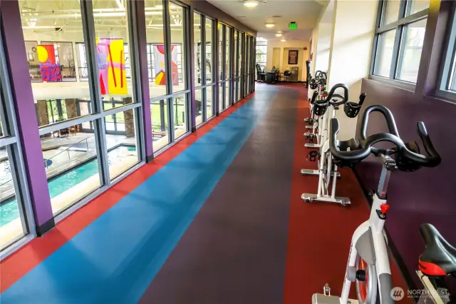 Above the pool is the indoor walking track with work-out stations around it.