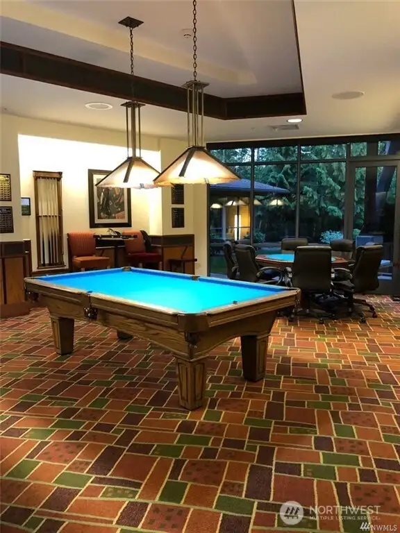 Enjoy a game of pool or poker in the club style room.