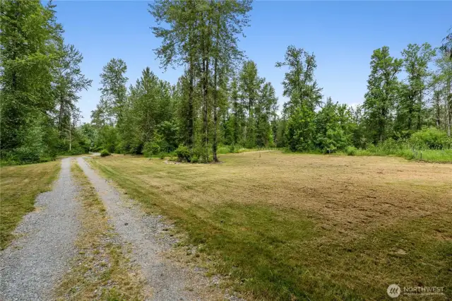 Home is located mid lot for ultimate privacy