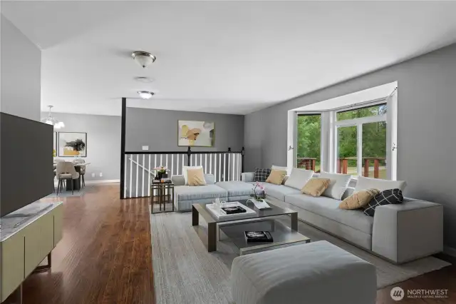 Large living room looks into dining room This room is virtually staged