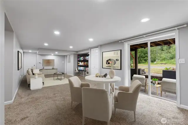 Lower floor living space This room is virtually staged