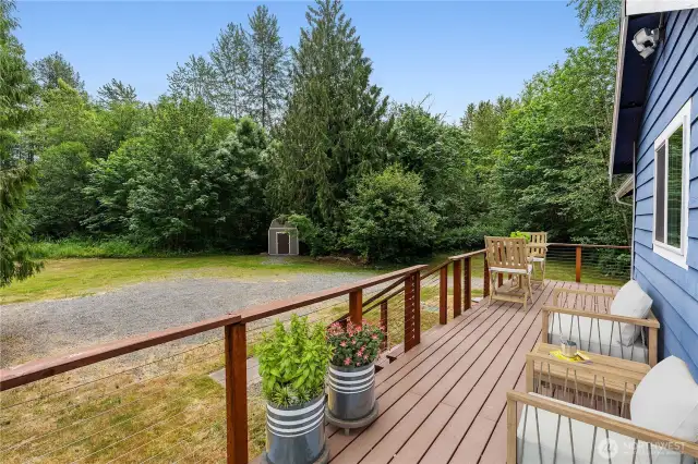 Durable Trex Deck is perfect for Pacific Northwest entertaining View off of rear deck This photo is virtually staged