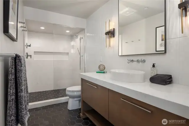 3/4 bathroom allows you to clean up after swimming or using the sports court
