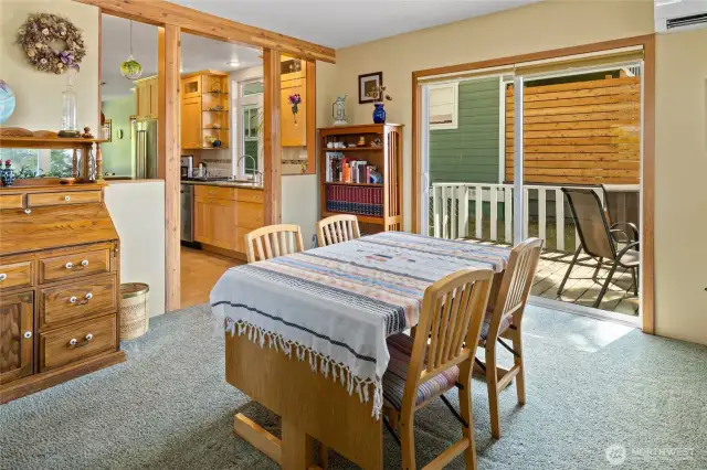 Dining space leads into the kitchen.