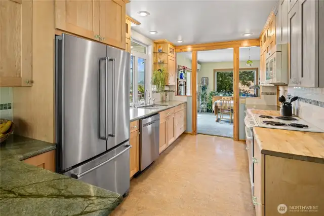 Kitchen located in between the dining area and eating nook.