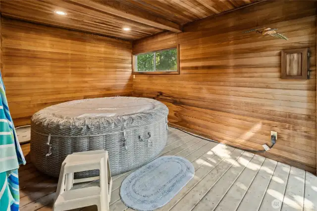 Fully enclosed room is the perfect spot for a hot tub or use for extra storage.