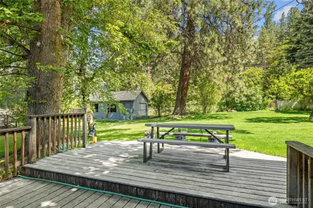 Deck space in the backyard offers a level spot for dining during the summer months.